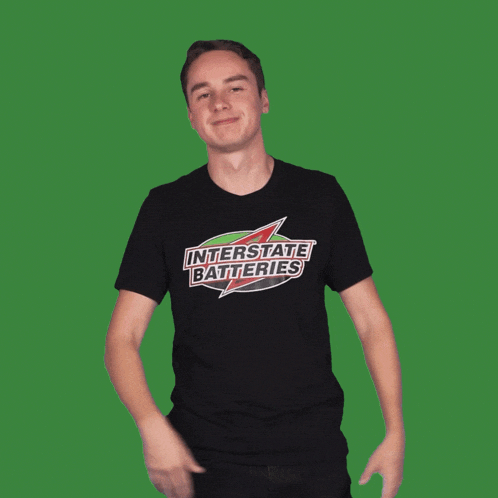a man is wearing a black shirt that says interstate batteries on it