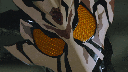 a close up of a motorcycle headlight with a tiger print