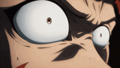a close up of a person 's eyes with a red eye