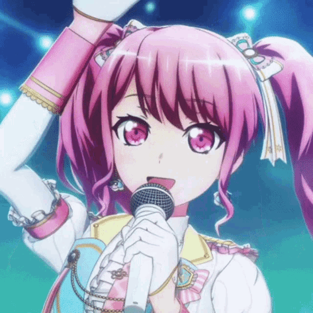 a girl with pink hair is holding a microphone in her hand