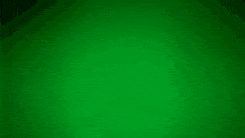 a police car is driving past a suv on a green screen .