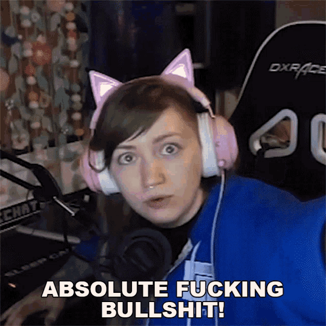 a woman wearing headphones and a cat ear headband says " absolute fucking bullshit "
