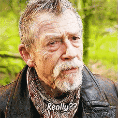 a man with a beard is wearing a scarf around his neck that says really ?