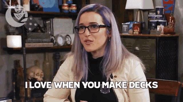 a woman with glasses and purple hair says i love when you make decks