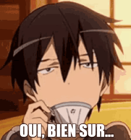 a man is drinking a cup of coffee and making a funny face while sitting at a table .