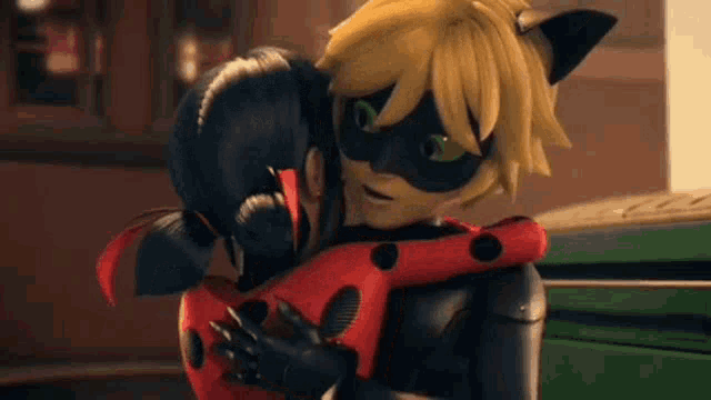 ladybug and cat noir from miraculous are hugging each other .