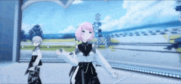 a girl with pink hair is dancing on a stage with a boy
