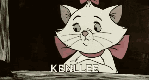a white cat with a pink bow and the name kenllee on the bottom