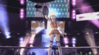 a woman in a wrestling ring is holding a trophy