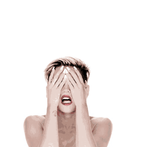 a woman covering her eyes with her hands and red lips