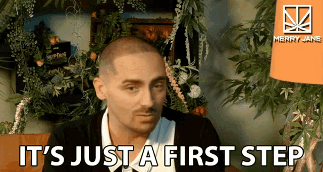 a man says it 's just a first step in front of some plants