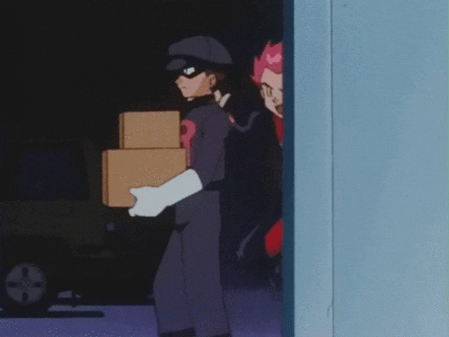 a man in a black hat and white gloves is holding a box in his hand