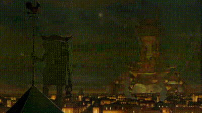 a statue of a samurai standing on top of a building at night .