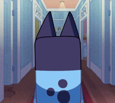 a cartoon cat is walking down a hallway with a light on the ceiling