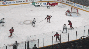 a hockey player with the number 32 on his jersey stands on the ice