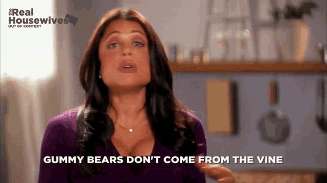 a woman says gummy bears do n't come from the vine in front of a real housewives logo