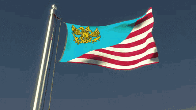 a red white and blue flag with a gold eagle on it
