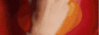 a close up of a red , white and orange painting .