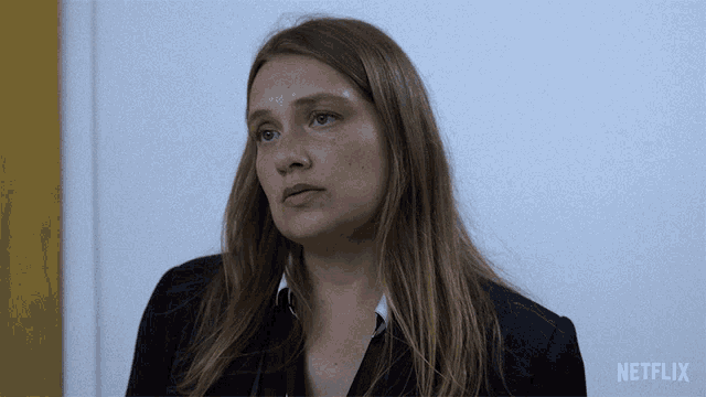 a woman 's face is featured in a netflix ad