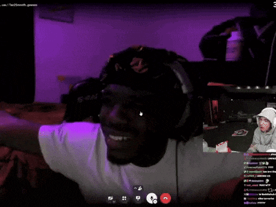 a man wearing headphones and a hat with a srn logo on it