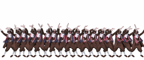 a group of men are standing in a row and one of them is falling