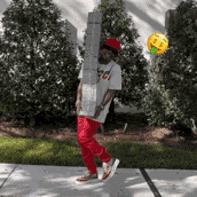 a man wearing a red hat and a white shirt with the word gucci on it