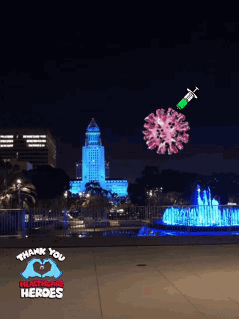 a sign that says thank you healthcare heroes with a fountain in the background