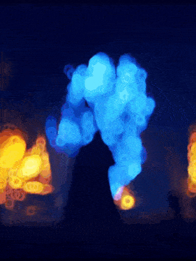 a silhouette of a person is surrounded by blue smoke and yellow lights