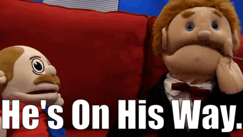 two puppet characters are sitting on a red couch with the words he 's on his way behind them