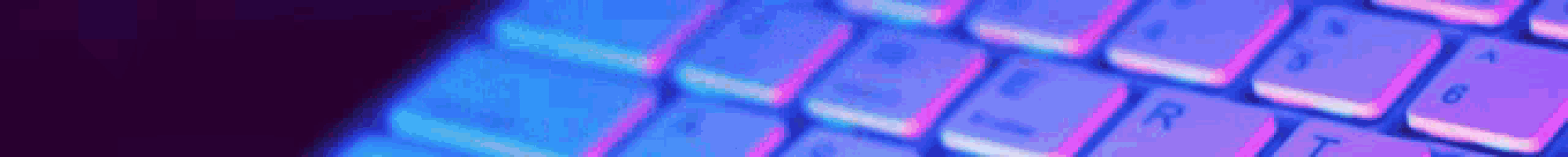 a close up of a purple and blue keyboard with a blurred background