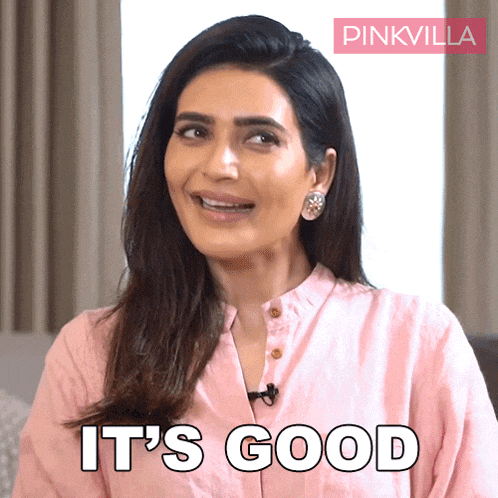 a woman says it 's good in front of a pink villa logo