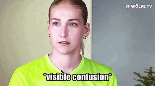 a woman is wearing a neon green shirt and says visible confusion