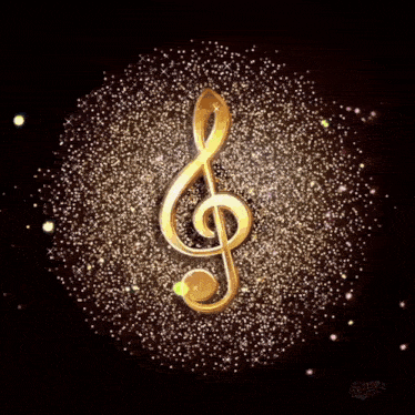 a gold treble clef is surrounded by sparkles on a black background .