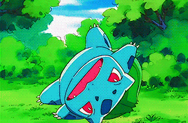 a cartoon pokemon is laying on its back in a field .
