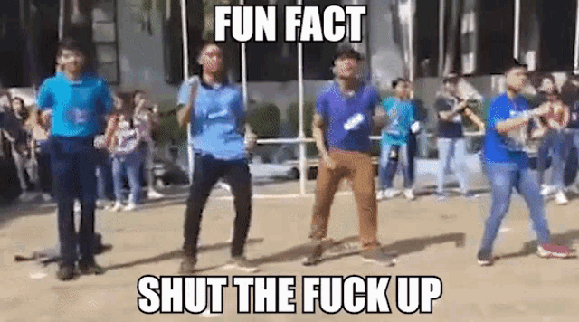 a group of men are dancing in front of a crowd with the words fun fact shut the fuck up .
