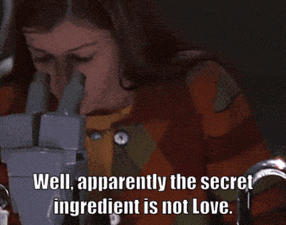 a woman says " well apparently the secret ingredient is not love " in a dark room