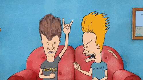 beavis and butthead are sitting on a red couch and beavis is wearing an ac dc shirt