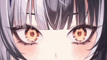 a close up of a girl 's eyes with a circle in the center