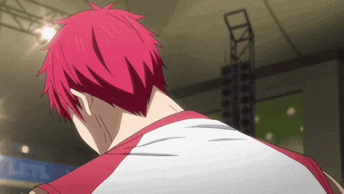 a man with red hair is wearing a white shirt with a red stripe