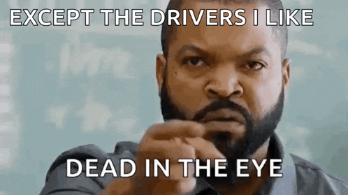 ice cube is making a funny face and saying except the drivers i like dead in the eye .