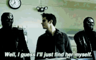 a man is standing in front of two masked men and says well i guess i 'll just find her myself ..