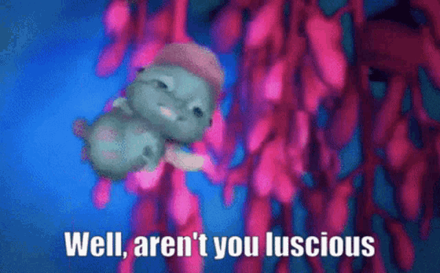 a cartoon of a worm with the words well aren 't you luscious