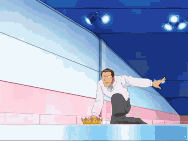 a man in a white shirt is holding a crown in his hand