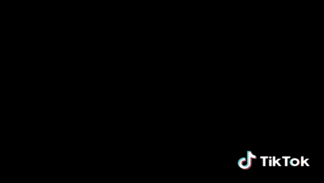 a blurred image of a camera with the numbers 1/125 open and 3db
