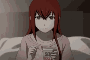 a girl with red hair is eating a cup of sis