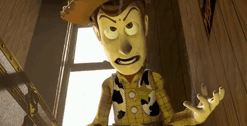 woody from toy story is making a very angry face while standing in front of a window .