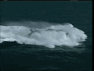 a military vehicle is floating on top of a body of water