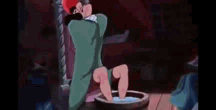 a cartoon character is splashing water into a cauldron on a table .