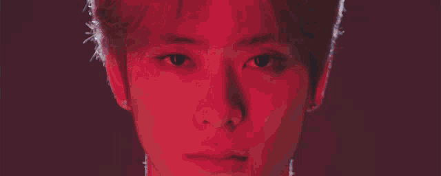 a computer generated image of a person 's face with numbers and letters