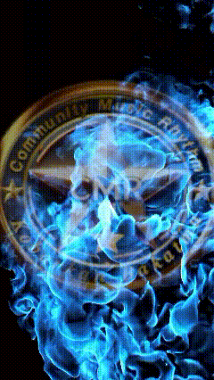 a coin that says ' united states marine corps ' is surrounded by blue flames